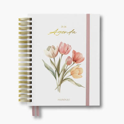 agenda académica 2025-2026 con anillas y portada con flores de hannai