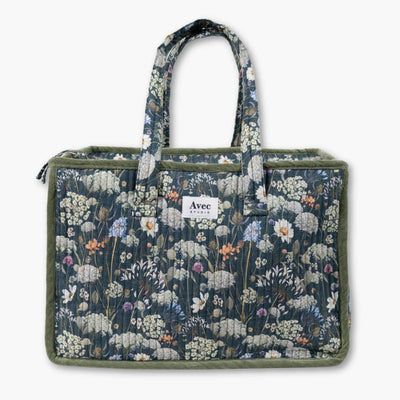 bolso de viaje de tela azul oscuro con flores