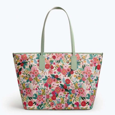 Bolso Garden Party de Rifle Paper Co. con estampado floral colorido, asas largas, y diseño espacioso.