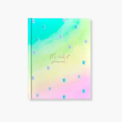 Cuaderno Bullet Journal Rainbow A5 con tapa dura decorativa y hojas punteadas.