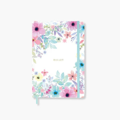 Cuaderno Bullet Journal Viviana, tapa dura floral, cinta azul, 128 páginas punteadas, detalles dorados.