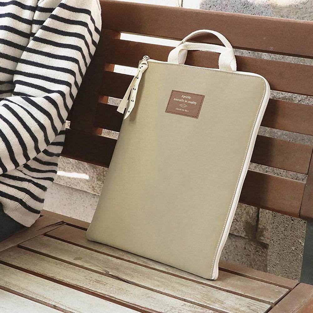 Funda para Portátil Cottony Beige, funda acolchada, múltiples compartimentos, asa cómoda, diseño elegante, protección portátil e iPad.