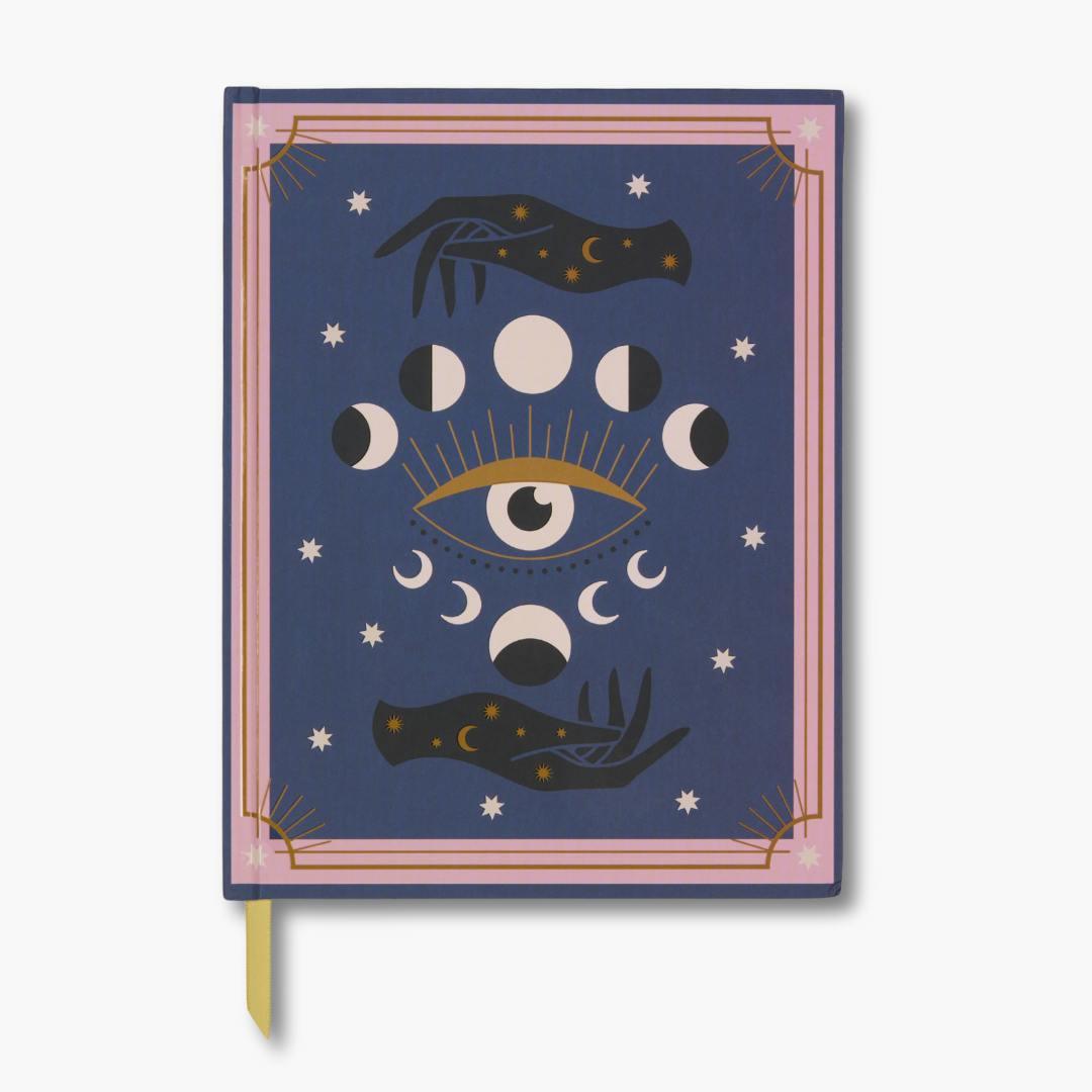 cuaderno A5 con portada de fases lunares