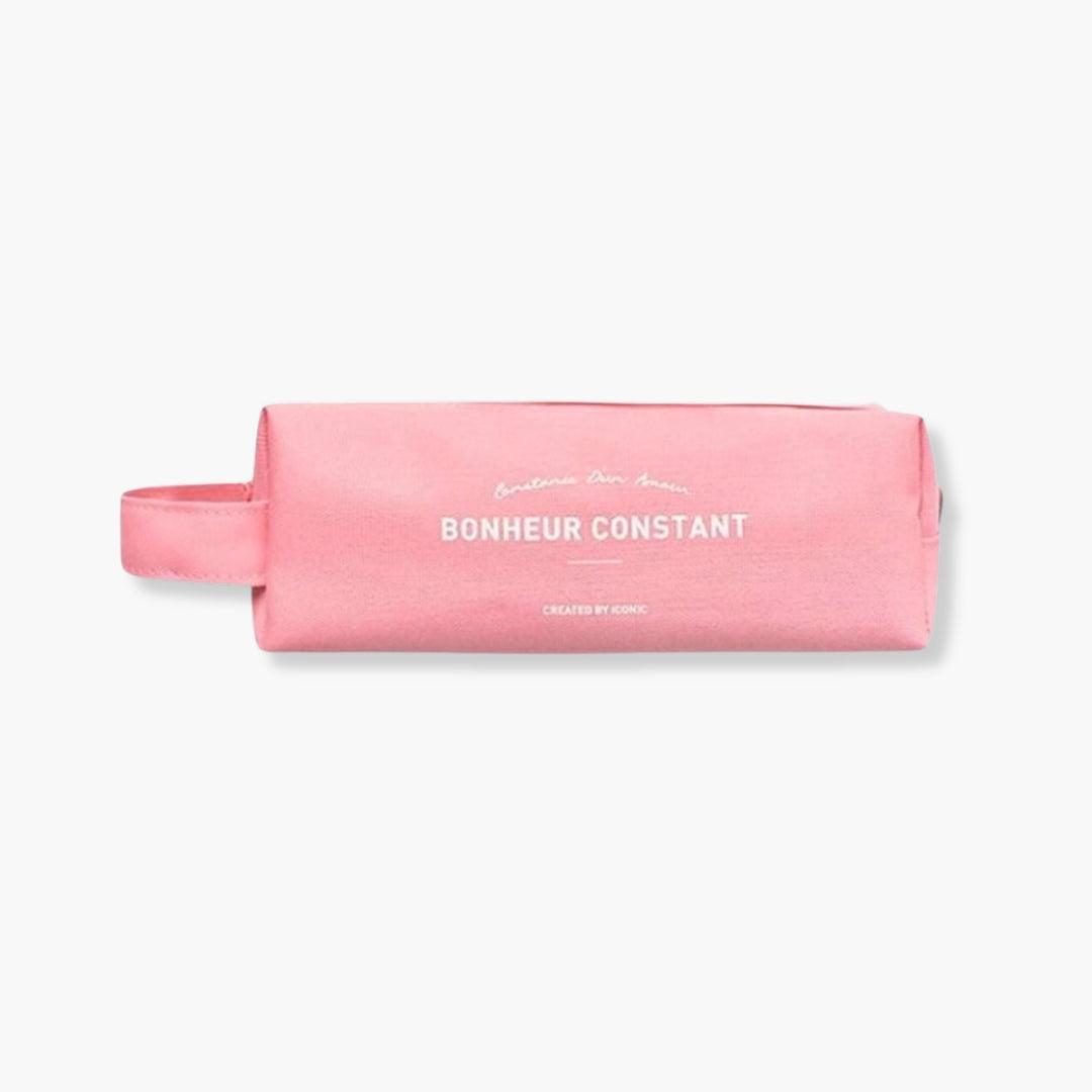 Estuche doble de tela de algodón rosa ICONIC con cierre de cremallera y dos compartimentos.