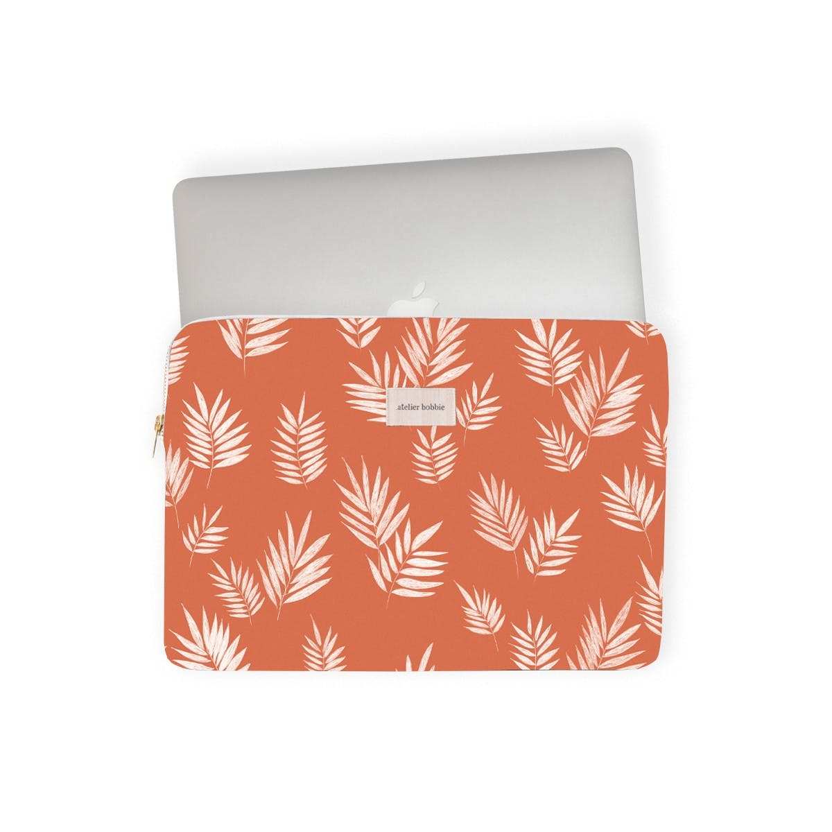 Funda para PC portátil Albane de algodón con estampado francés, cierre seguro, diseño elegante, color terracota.