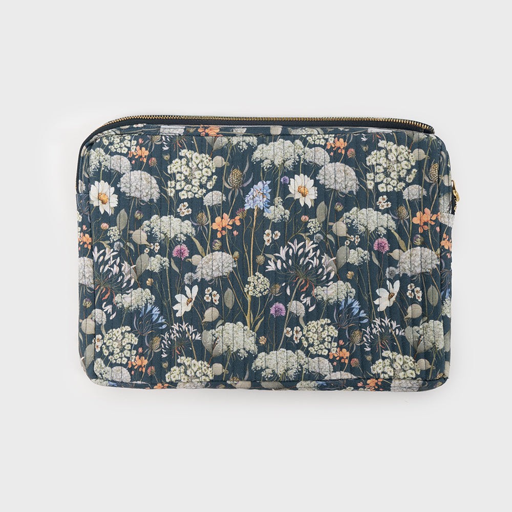 funda portátil de tela azul oscuro con flores