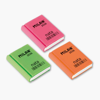 Goma de borrar Milan Libro en forma de libro con colores vibrantes naranja, rosa y verde.