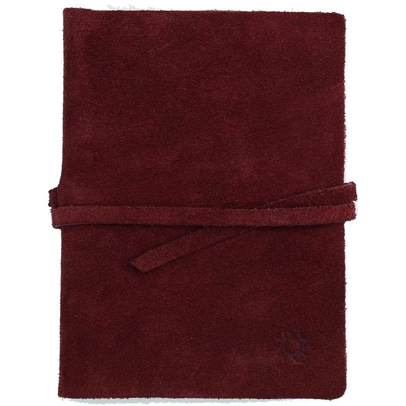 Libreta de piel de vacuno con diseño entrelazado artesanal, color burdeos.