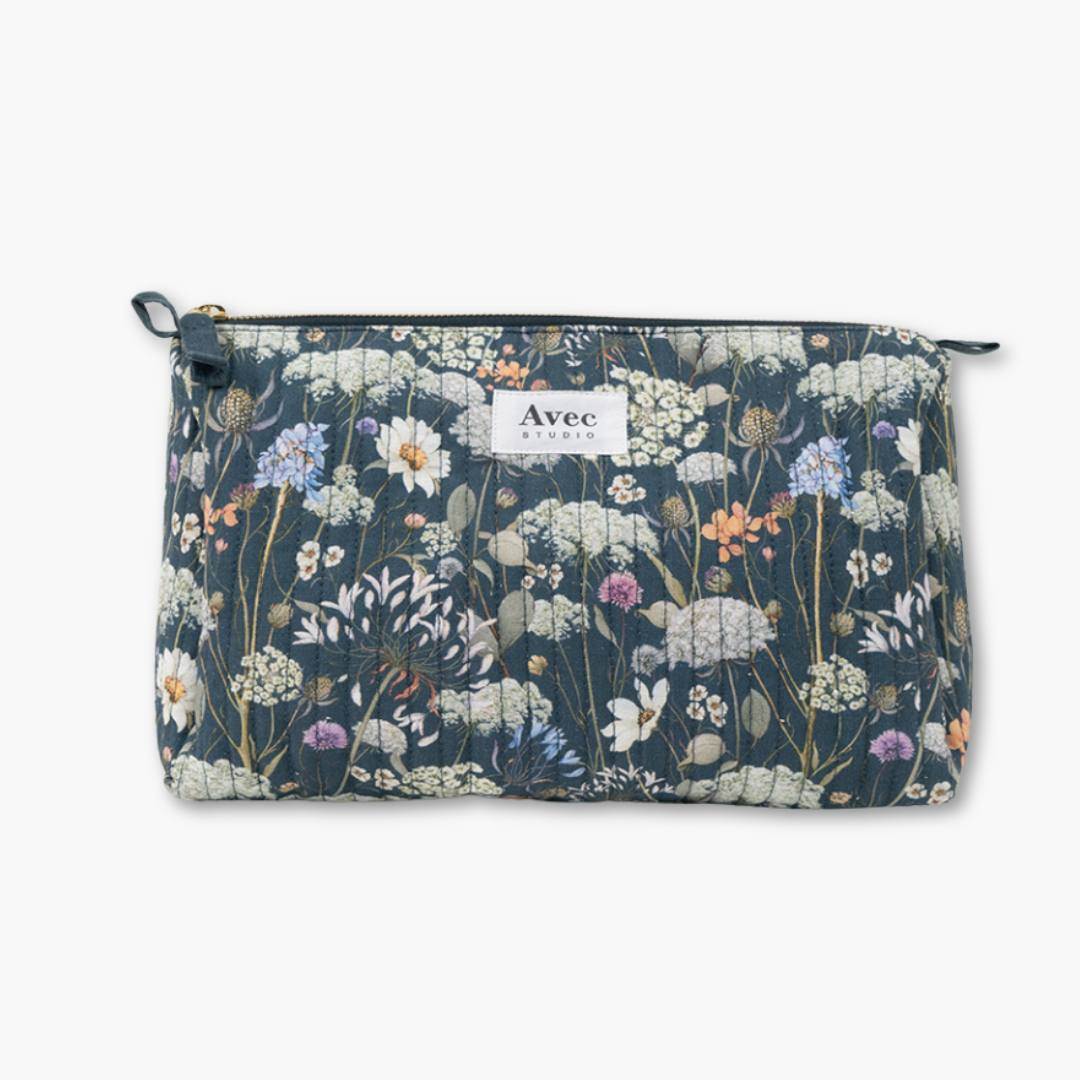 neceser grande azul oscuro con flores