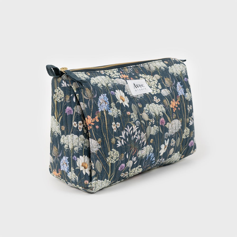 neceser grande azul oscuro con flores