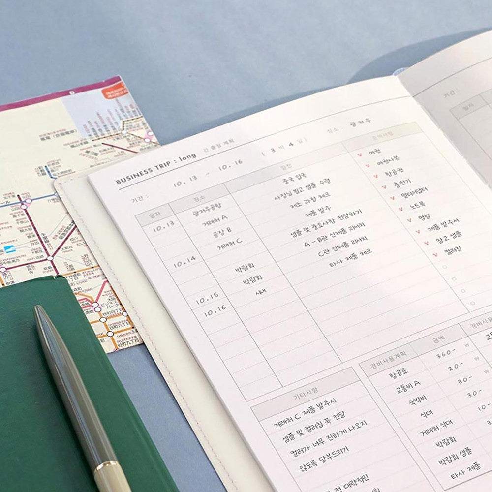 Office Planner ICONIC Ivory with flexible PVC cover and pen.