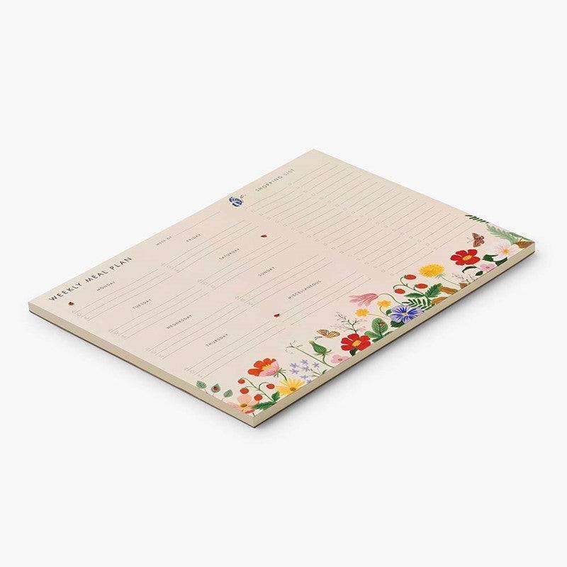 Planificador semanal de menú de la colección Strawberry Fields con diseño floral y lista de compras microperforada.