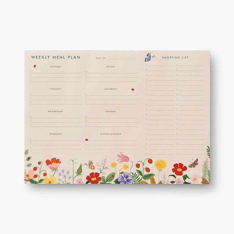 Planificador Semanal de Menú con diseño floral y lista de compras microperforada.