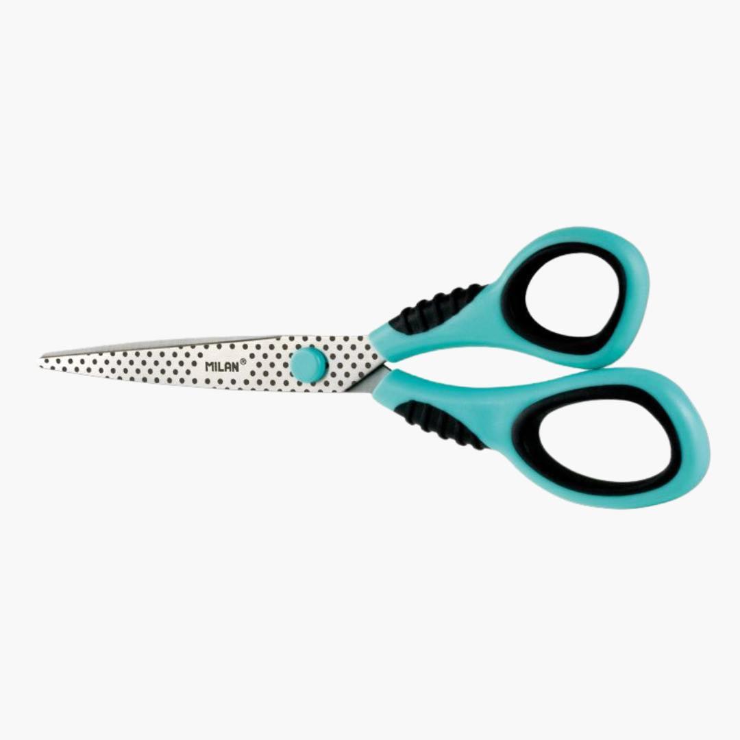 Tijeras de oficina con diseño de topos y empuñadura turquesa.