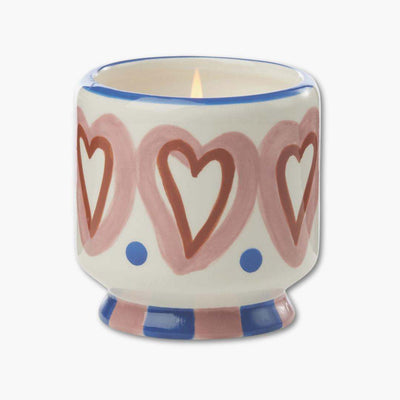 vela perfumada paddywax en recipiente de cerámica pintada con corazones