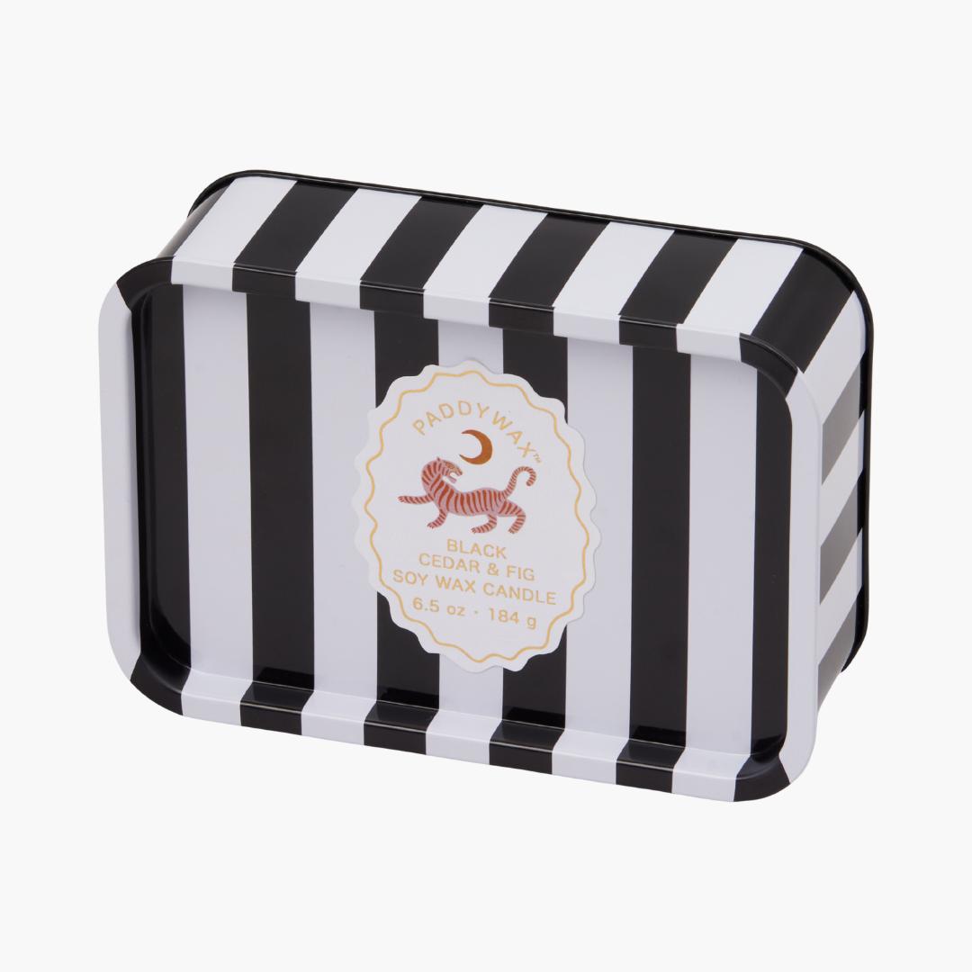 lata con vela con diseño de rayas en colores blanco y negro