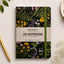 Cuaderno A5 Alljoy Design Midnight Meadow con flores silvestres sobre fondo negro