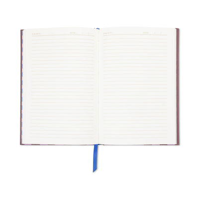 Cuaderno Framed Floral Magnolia Journal abierto mostrando las paginas rayadas
