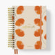 agenda académica 2025-2026 con anillas y portada con flores de hannai