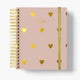 agenda 2026 con anillas y portada rosa con corazones dorados