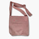 bolsa de tela color rosa y asas ajustables