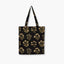 Bolsa de tela multiusos negra con estampado floral, diseño elegante de House Doctor.