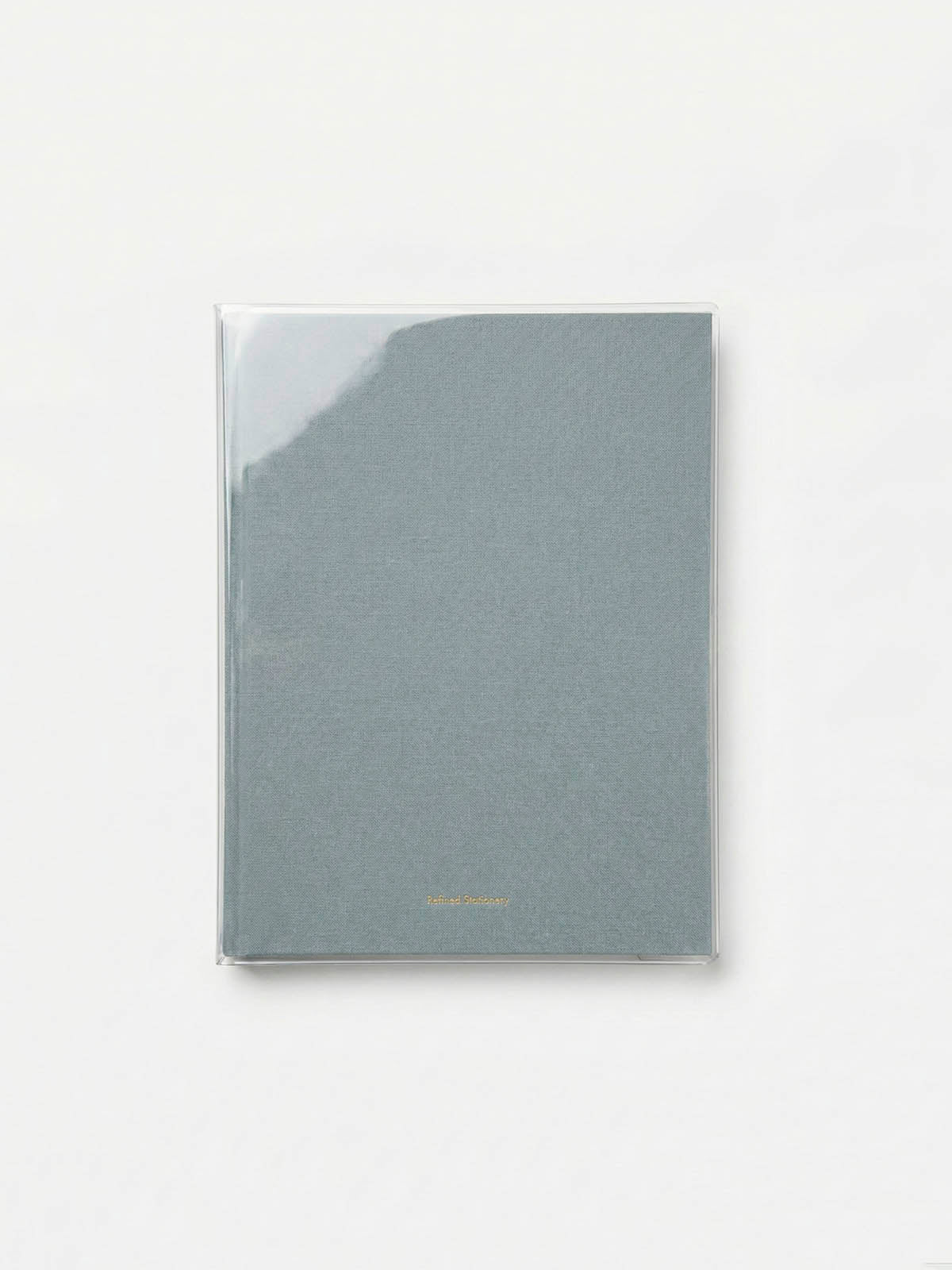 Funda transparente protectora sobre cuaderno hardcover azul del sistema 1·9