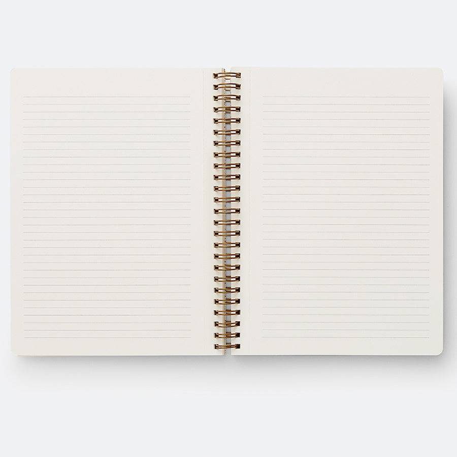 Libreta Bon Voyage A5 con anillas doradas y páginas rayadas.
