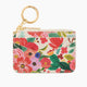 Llavero Monedero Garden Party con estampado floral, multifuncional y compacto.