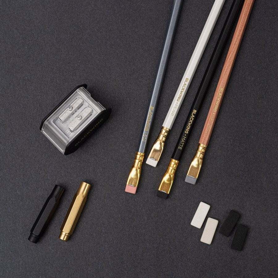 Set Starting Point BLACKWING pencils, sharpener, erasers, and point protectors on display.